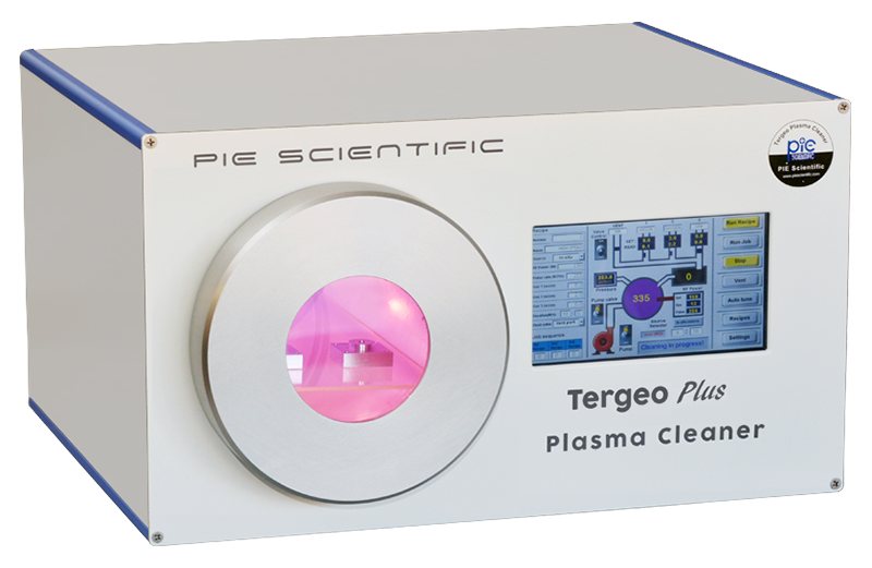 Tergeo-Plus oxygen plasma asher with pink plasma glowing in the quartz chamber