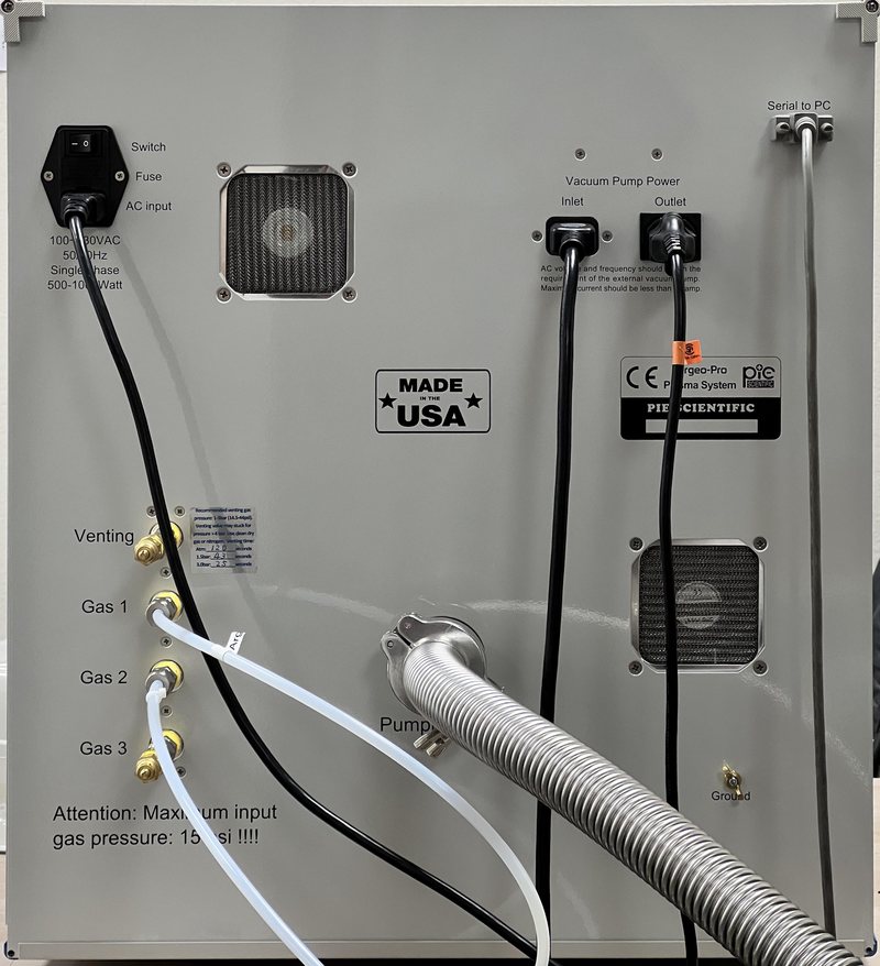 Rear panel of a Tergeo-Pro vacuum plasma system with three gas inputs, venting port, pump port, pump power outlet and serial port